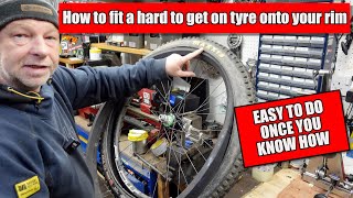 How to fit a really difficult fitting tyre to a Bike wheel [upl. by Clellan]