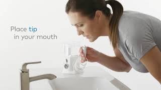 How to Use the Waterpik™ Nano Water Flosser WP310 [upl. by Aikym]