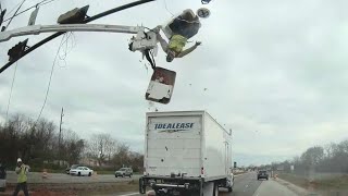 Truck crash sends worker flying out of construction bucket [upl. by Ambrosi]